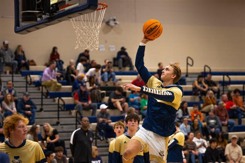 Students play basketball